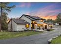 Charming two-story home with a well-manicured lawn and stylish design, perfect for modern living with great curb appeal at 347 S White Tail Dr, Franktown, CO 80116