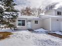 Home exterior showcasing well-maintained facade, front door, and garage at 16390 E Radcliff Pl # B, Aurora, CO 80015