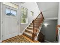 Bright foyer features a staircase and entry to the home at 3240 Spruce St, Denver, CO 80238