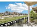 Neighborhood street view of well-maintained homes and green lawns at 5388 Routt St # B, Arvada, CO 80002