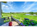 Enjoy breathtaking views of the golf course from this home with a water feature visible from the property at 3751 W 136Th Ave # F4, Broomfield, CO 80023