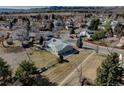 Areal view showcasing the home's location in the area, set on a spacious lot in a suburban neighborhood at 7160 S Jellison St, Littleton, CO 80128