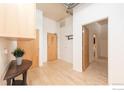 Spacious entryway with wood floors and storage at 3100 Huron St # 3P, Denver, CO 80202