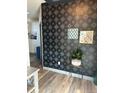 Hallway area with star pattern wall and modern decorations at 6792 Canosa St, Denver, CO 80221
