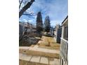 Peaceful view of townhome community with mature trees and landscaped common areas at 8335 Fairmount Dr # 8-206, Denver, CO 80247
