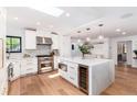 Modern kitchen with stainless steel appliances and a quartz island at 1065 S Monroe St, Denver, CO 80209