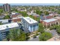 A lush and established neighborhood with mature trees and diverse architecture at 555 E 10Th Ave # 111, Denver, CO 80203