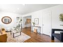 Bright and airy living room with hardwood floors and stylish modern decor at 5167 S Pearl St, Littleton, CO 80121