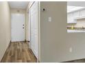 Hallway with a closet and front door at 14152 E Linvale Pl # 408, Aurora, CO 80014