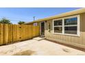 Cozy home featuring a fenced yard, offering privacy and a welcoming entrance at 311 Harrison Ave, Fort Lupton, CO 80621
