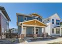 Stylish two-story home with a welcoming covered porch and modern landscaping at 920 Promenade Dr, Superior, CO 80027