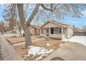 Lovely home showcasing a pleasant exterior and a neatly kept yard at 1735 Dayton St, Aurora, CO 80010