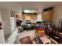 Spacious kitchen with custom cabinets and ample counter space at 14874 E 52Nd Ave, Denver, CO 80239