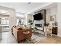 Spacious living room with fireplace and large windows at 4060 W 16Th Ave, Denver, CO 80204