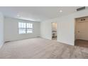 Spacious bedroom with carpet flooring and large window at 241 Paloma Way, Elizabeth, CO 80107