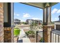 View from the porch of a charming street with similar style homes at 4581 S Kipling Cir, Denver, CO 80123