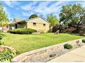 Charming single story home with well maintained front yard and brick garden beds at 3531 E 91St Ave, Thornton, CO 80229