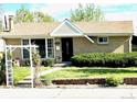 A quaint one-story house with a well-maintained lawn and landscaping at 3531 E 91St Ave, Thornton, CO 80229