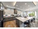 Bright kitchen features a large island, stainless steel appliances, and ample cabinet space for culinary enthusiasts at 445 Panoramic Dr, Monument, CO 80132
