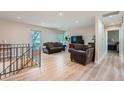 Bright living room boasting modern flooring, neutral walls, and an open, airy layout at 15691 E Atlantic Cir, Aurora, CO 80013