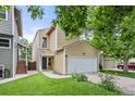 A charming home with a well-maintained lawn, two-car garage, and inviting curb appeal at 76 Mineola Ct, Boulder, CO 80303