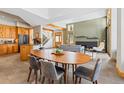 Spacious living area with stylish furnishings, open layout, fireplace, and a seamless flow for entertaining at 293 Settlers Dr, Breckenridge, CO 80424