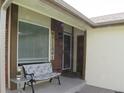 Cozy front porch with seating area and a welcoming entrance to the residence at 17671 E Brown Cir, Aurora, CO 80013