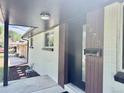 Close up of front door entry with modern house numbers and covered porch at 8873 Princeton St, Westminster, CO 80031