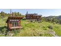 Charming multi-level mountain home with private balcony and scenic view at 393 Dixon Rd, Boulder, CO 80302