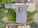 Birds eye view of a home's roof, backyard, and patio, showcasing the property's layout and outdoor space at 2210 Miller St, Lakewood, CO 80215
