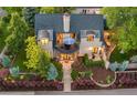 Beautiful aerial view of a well-maintained home, showcasing its manicured landscaping, balcony, and inviting outdoor space at 6901 E 12Th Ave, Denver, CO 80220