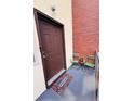 Cozy front porch with seating and welcome mat for a warm, inviting entry at 500 30Th St # 5, Denver, CO 80205
