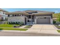 Charming single-story home featuring stone accents, neutral color palette, and a well-manicured front yard at 3436 W 154Th Ave, Broomfield, CO 80023