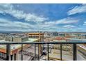 Breathtaking city skyline view from the balcony with mountains in the distance at 1777 Larimer St # 2201, Denver, CO 80202