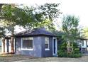 Charming single-story home with a brick exterior, well-maintained landscaping, and a welcoming entrance at 1300 Spruce St, Denver, CO 80220