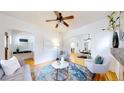 Bright living room with hardwood floors, stylish furnishings, and open layout at 588 S Grant St, Denver, CO 80209