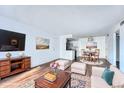 Open-concept living and dining areas perfect for entertaining Gathering and friends at 922 S Walden Street St # 103, Aurora, CO 80017