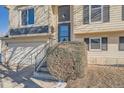 House entrance with steps leading to the front door and landscaping at 2808 S Fundy St, Aurora, CO 80013