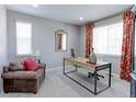Bright and airy office featuring a modern desk, comfortable seating, and stylish décor at 16021 Williams Pl, Broomfield, CO 80023
