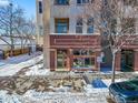 Brick building exterior and fire hydrant in front at 4383 Tennyson St # 1A, Denver, CO 80212