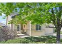 Inviting front entrance with a cozy porch area and a well-maintained garden at 2420 E 127Th Ave, Thornton, CO 80241