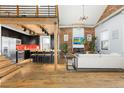 Modern kitchen with stainless steel appliances and an island at 3260 Curtis St, Denver, CO 80205