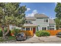 Beautiful home exterior featuring a well-manicured lawn and mature trees at 5150 Buckingham Rd, Boulder, CO 80301