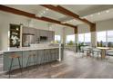 Bright, modern kitchen featuring sleek countertops, stainless steel appliances, and mountain views at 586 Alpine Way, Idaho Springs, CO 80452