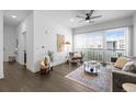 Bright living room featuring modern decor, wood floors, and an open layout at 2525 Arapahoe St # Rd315, Denver, CO 80205
