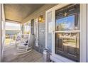 Welcoming front porch with rocking chairs and decorative accents, creating a cozy entrance at 529 Olympia Ave, Longmont, CO 80504