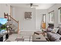 Inviting living room featuring hardwood flooring and modern decor at 3241 Sheridan Blvd, Wheat Ridge, CO 80212