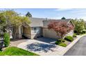 Beautiful ranch home with attached garage, manicured lawn, and mature trees in a quiet neighborhood at 9567 Brentwood Way # A, Broomfield, CO 80021