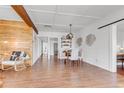 Open-concept dining area with wood floors, modern decor, and plenty of space for entertaining guests at 505 S Roosevelt Rd, Lafayette, CO 80026