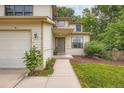 Charming two-story home featuring a front entrance walkway and well-manicured lawn at 912 S Galena St, Aurora, CO 80247